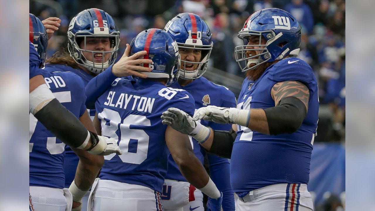 Giants, Eli Manning snap historic losing streak, defeat Dolphins, 36-20