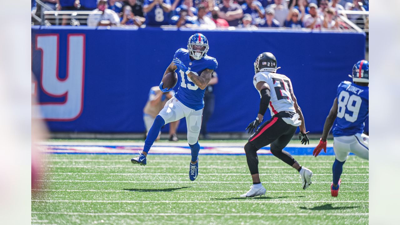 Referee Adrian Hill (29) watches a replay screen during an NFL