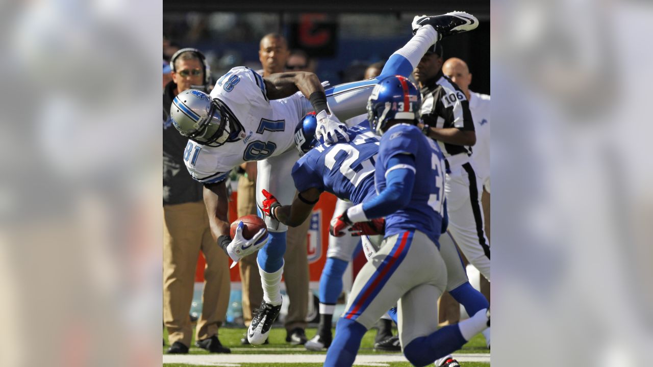 East Rutherford, NJ. 18/12/2022, Detroit Lions wide receiver Amon-Ra St.  Brown (14) makes a catch during a NFL game against the New York Jets on  Sunday, Dec. 18, 2022 in East Rutherford