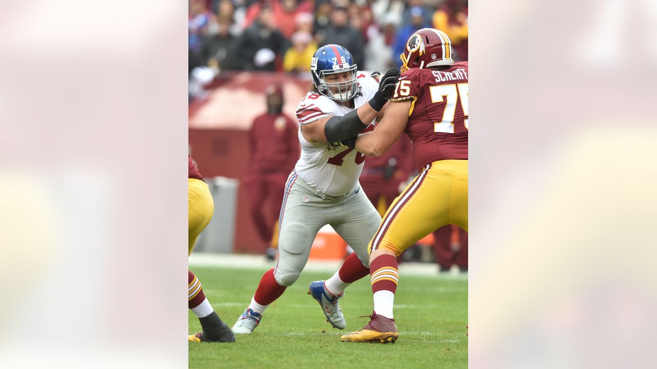 New York Giants defensive tackle Markus Kuhn (78) is fired up after an  interception by a teammate in an NFL football game between the New York  Giants and Dallas Cowboys on Sunday