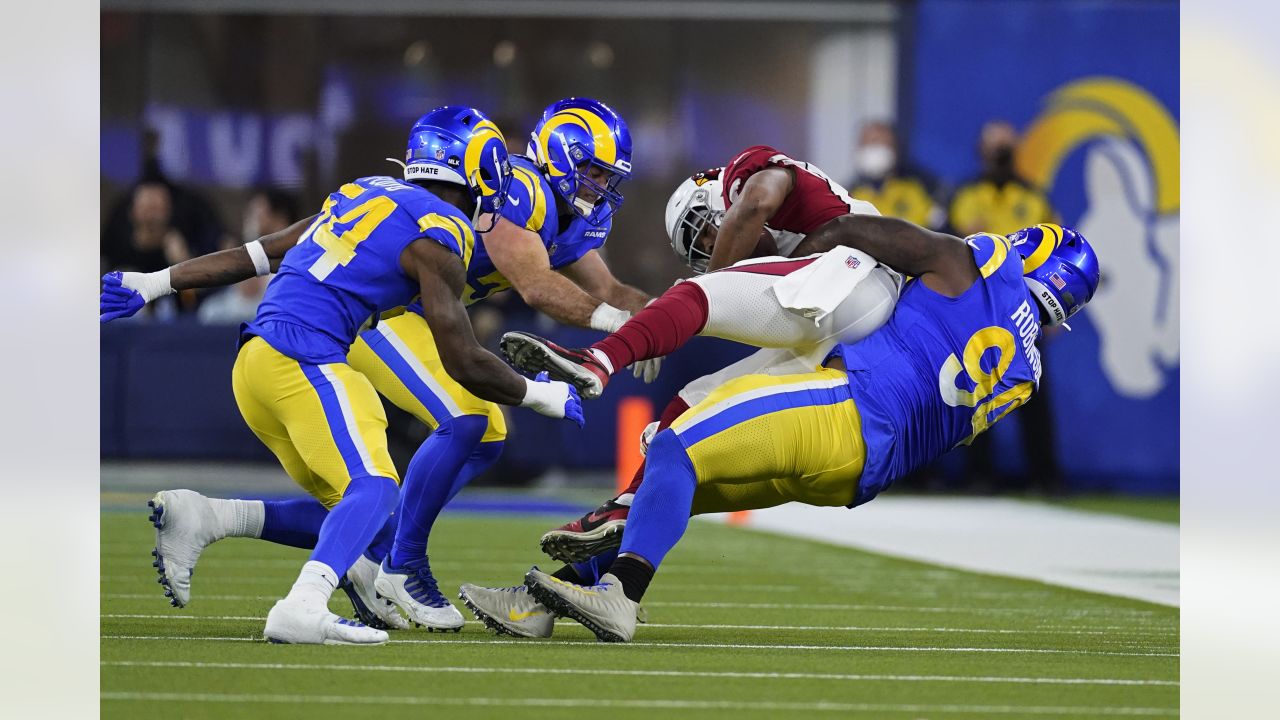 Los Angeles Rams defensive end Aaron Donald (99) celebrates during the  first half of an NFL wild-card playoff football game against the Arizona  Cardinals in Inglewood, Calif., Monday, Jan. 17, 2022. (AP