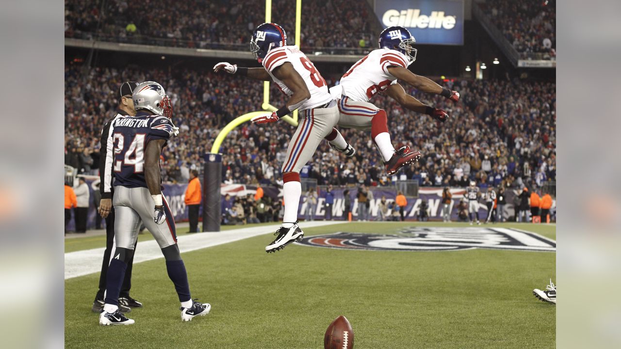 New York Giants wide receiver Hakeem Nicks (88) and wide receiver Mario  Manningham (82) celebrate Manningham's touchdown during second quarter NFL  action between the New York Giants and Detroit Lions at the