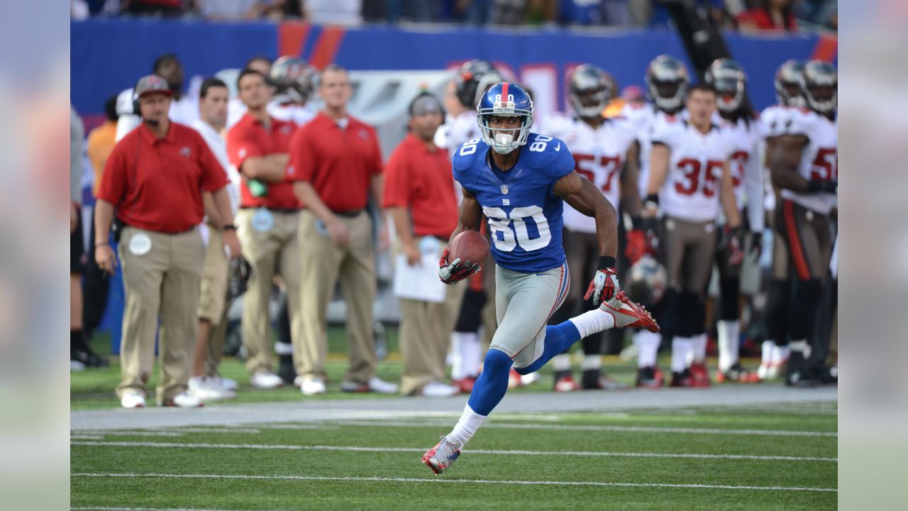 Tampa Bay Buccaneers Ronde Barber chases New York Giants Victor Cruz who  catches an 80 yard touchdown pass in the fourth quarter in week 2 of the  NFL season at MetLife Stadium