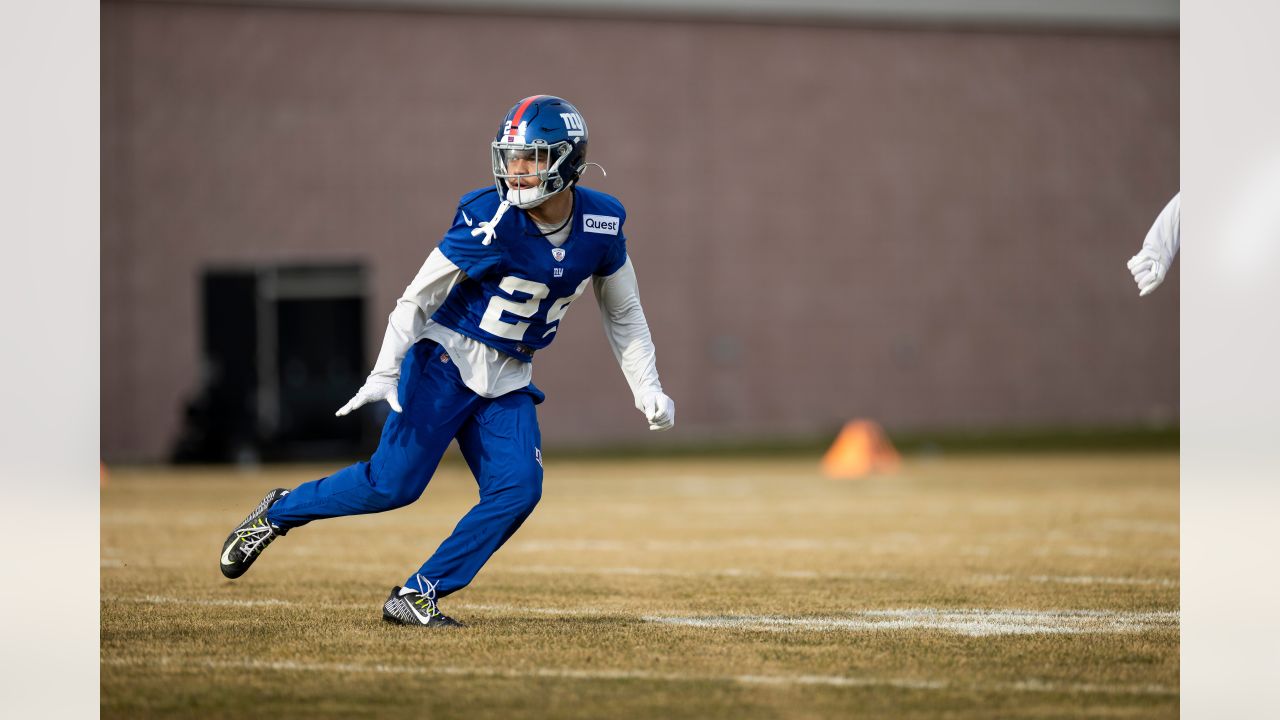 New York Giants Michael Strahan points his finger in the air and winks  while walking off of the field in week 13 at Giants Stadium in East  Rutherford, New Jersey on December