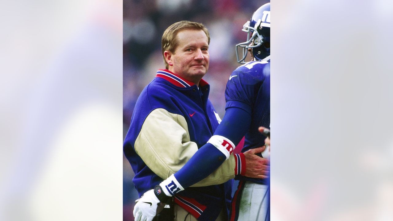 New York Giants head coach Jim Fassel wears his 2000 Super Bowl