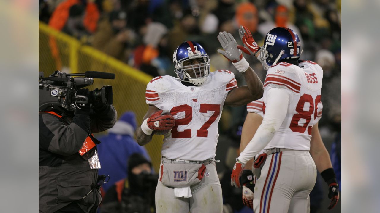 New York Giants tight end Kevin Boss (89) talks with tight ends coach  Michael Pope during NFL football practice for Sunday's playoff game against  the Dallas Cowboys Friday, Jan. 11, 2008 in