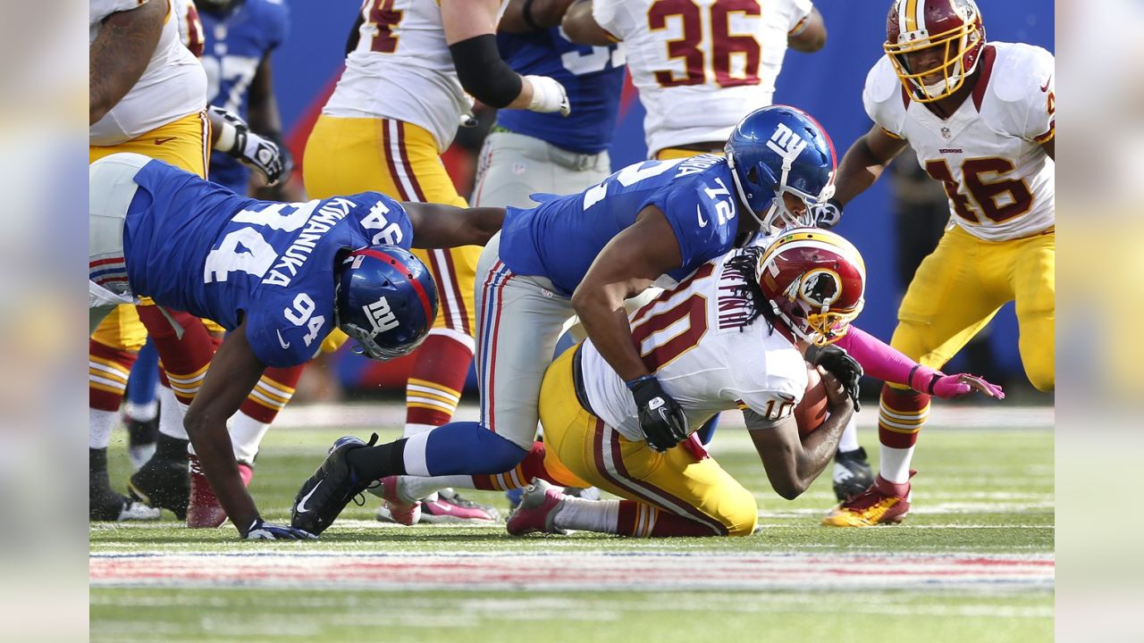 Giants defensive end Osi Umenyiora ends stalemate, will practice