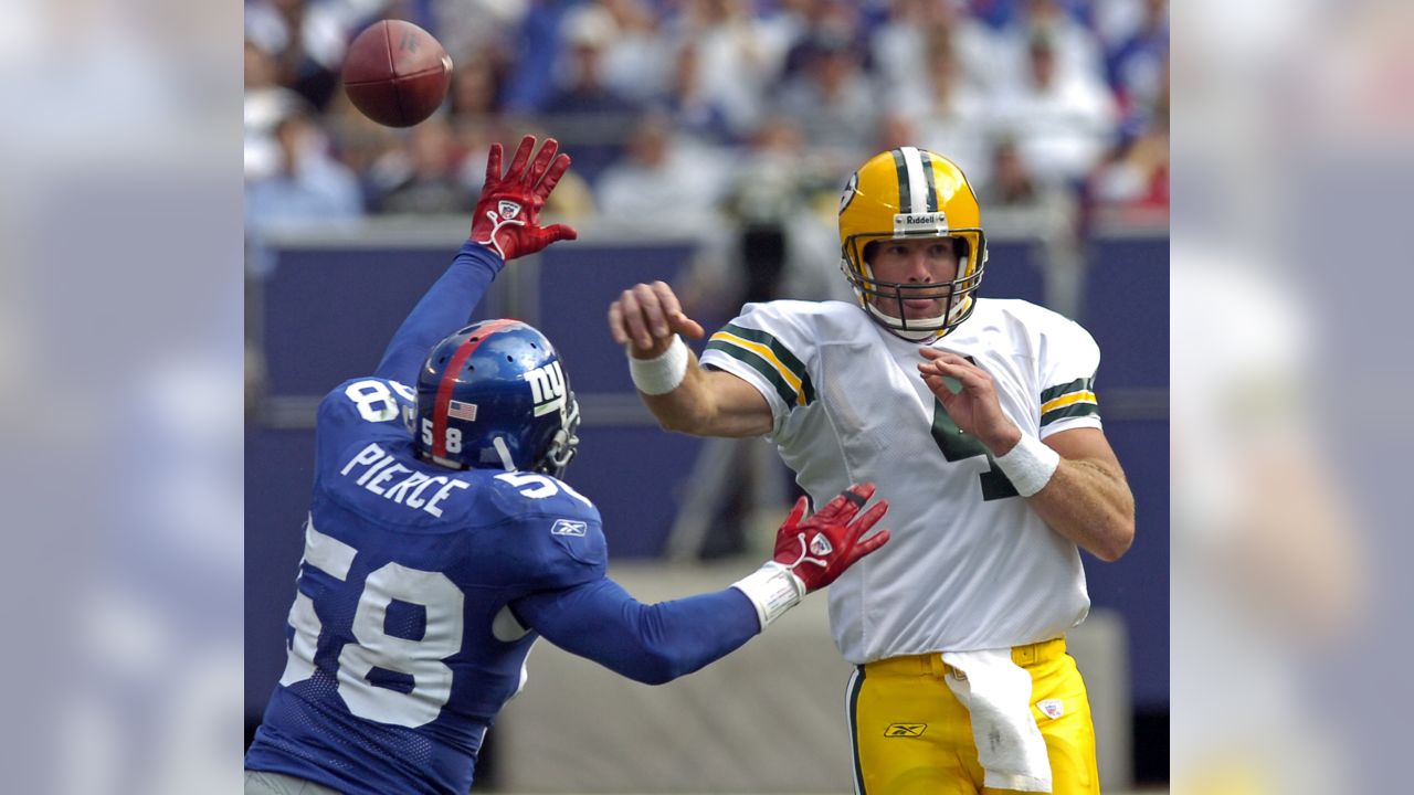 Green Bay Packers' quarterback Brett Favre reacts after fullback William  Henderson ran for a touchdown in the fourth quarter against the Atlanta  Falcons Sunday, Sept. 8, 2002, in Green Bay, Wis. The