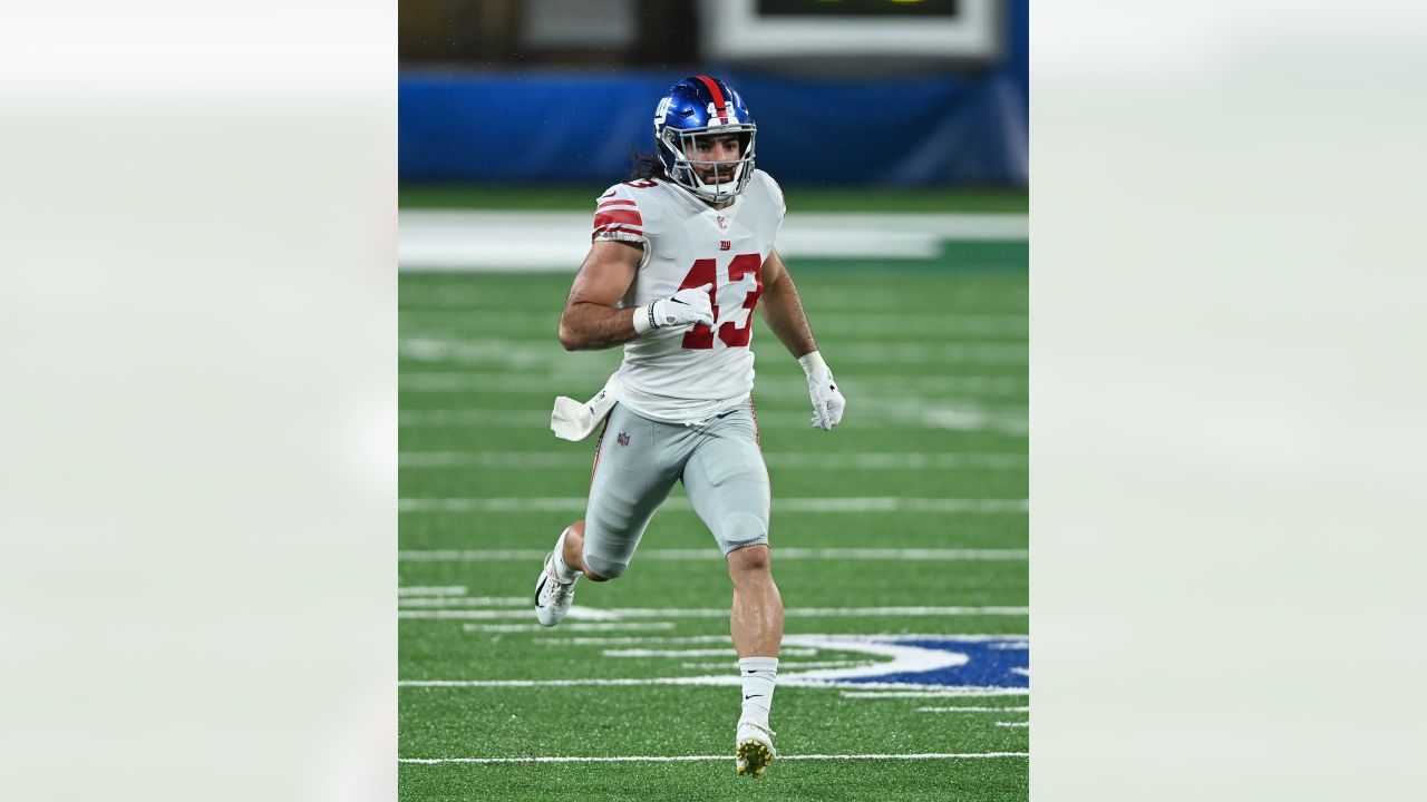 New York Giants cornerback Darnay Holmes (30) warms up before playing  against the Houston Texans in an NFL football game, Sunday, Nov. 13, 2022,  in East Rutherford, N.J. (AP Photo/John Minchillo Stock