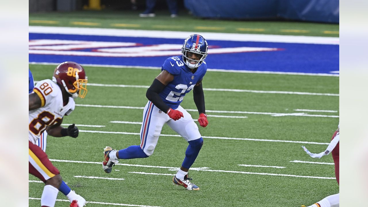 New York Giants cornerback Prince Amukamara (20) gets an interception in an  NFL football game between the New York Giants and Dallas Cowboys on Sunday,  October 19th, 2014, at AT&T Stadium in