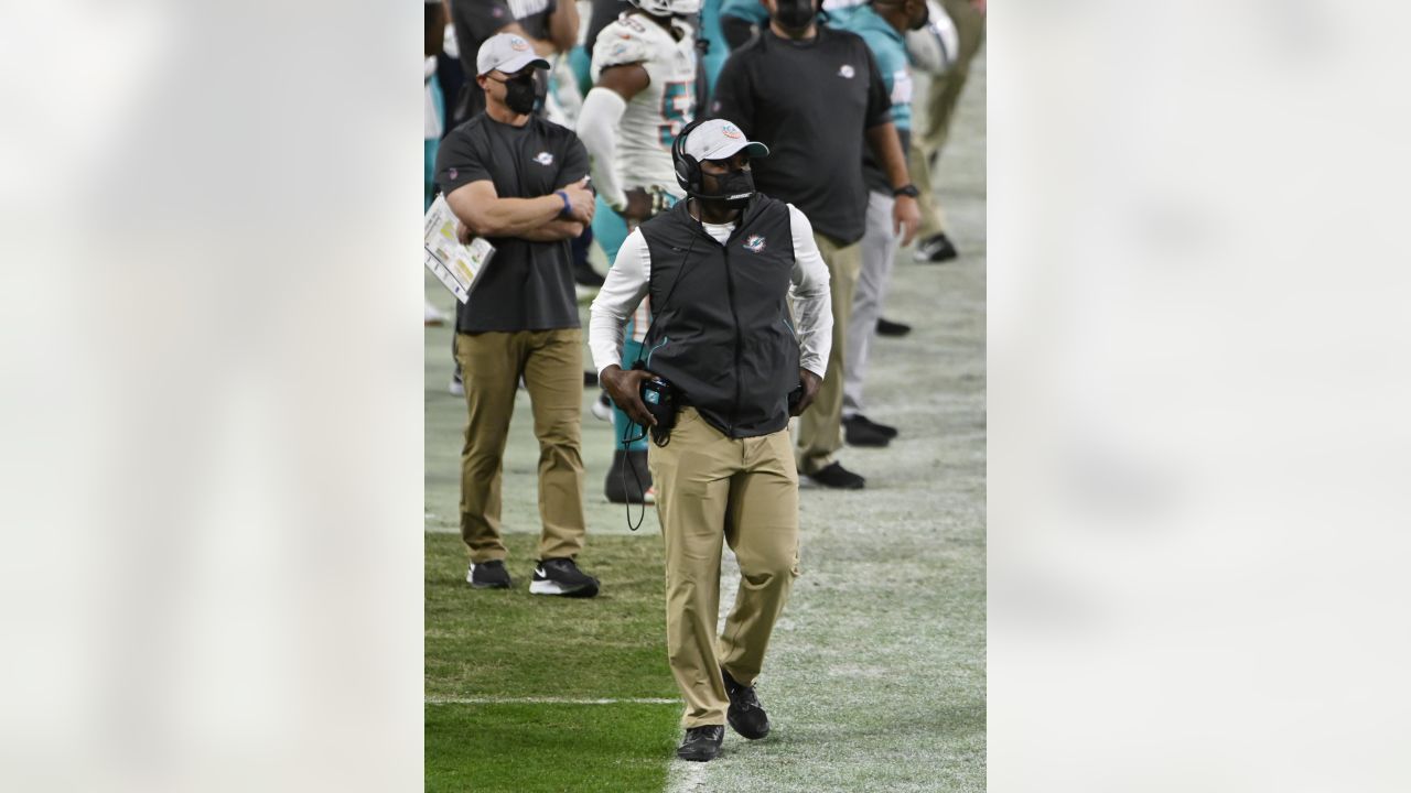 Miami Dolphins head coach Brian Flores attends a news conference after an  NFL football game against the Las Vegas Raiders, Sunday, Sept. 26, 2021, in  Las Vegas. (AP Photo/David Becker Stock Photo 