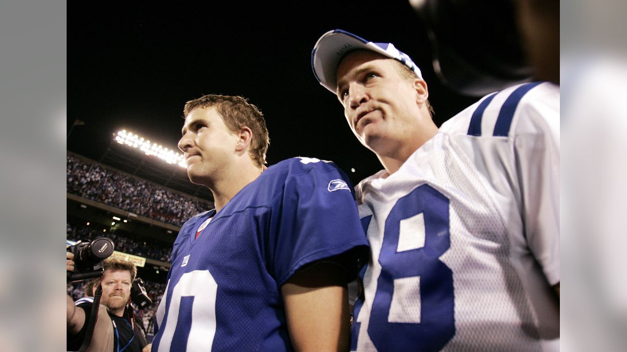 New York Giants Eli Manning and Indianapolis Colts Peyton Manning exchange  words while walking off of the field in week 1 at Giants Stadium in East  Rutherford, New Jersey on September 10