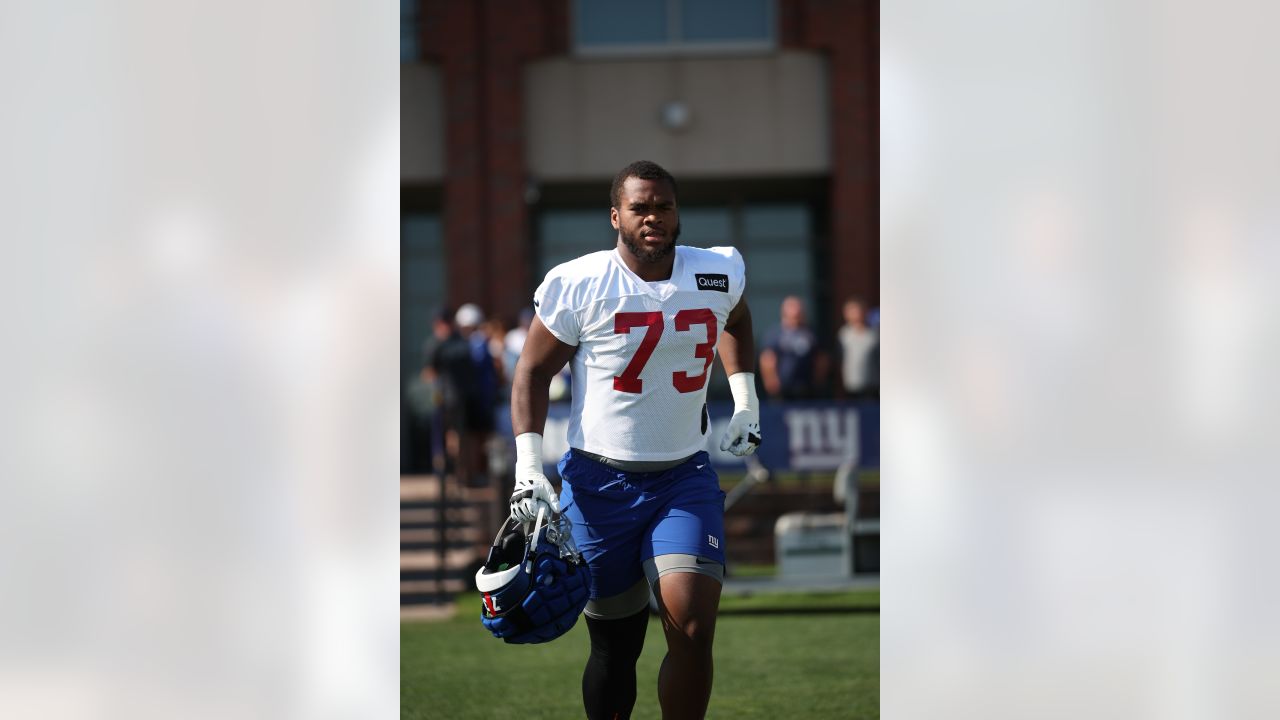 Rookie Evan Neal feels comfortable back in No. 73