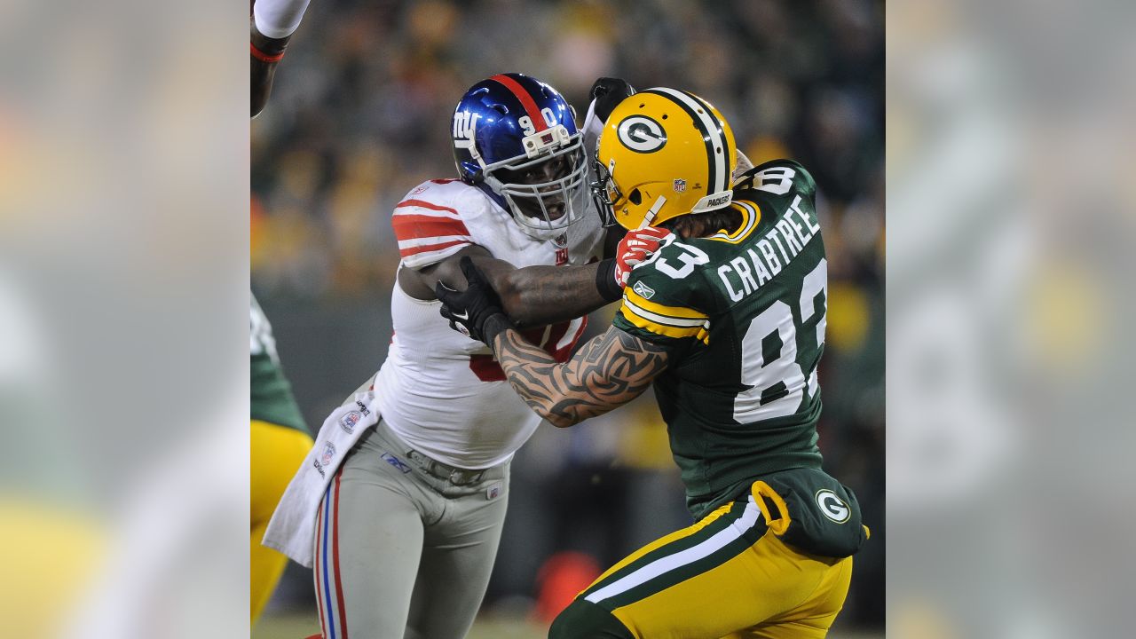 Washington Redskins' Robert Griffin III is sacked in the 1st quarter by Green  Bay Packers' Clay Matthews and A.J. Hawk at Lambeau Field in Green Bay,  Wisconsin, on Sunday, September 15, 2013. (