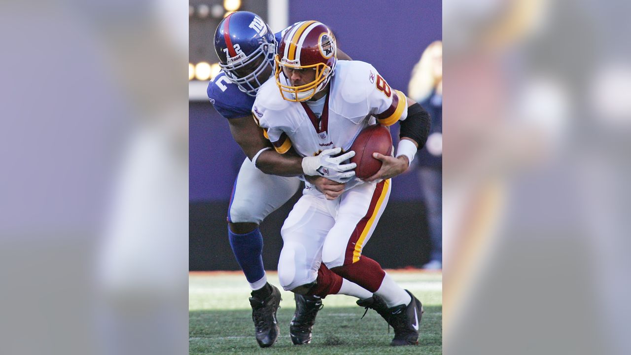 New York Giants wide receiver Isaiah Hodgins (18) runs with the ball  against the Washington Commanders during an NFL football game Sunday, Dec.  4, 2022, in East Rutherford, N.J. (AP Photo/Adam Hunger