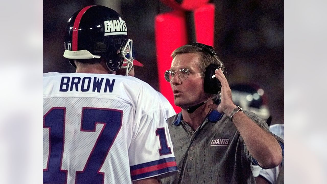 New York Giants head coach Jim Fassel wears his 2000 Super Bowl