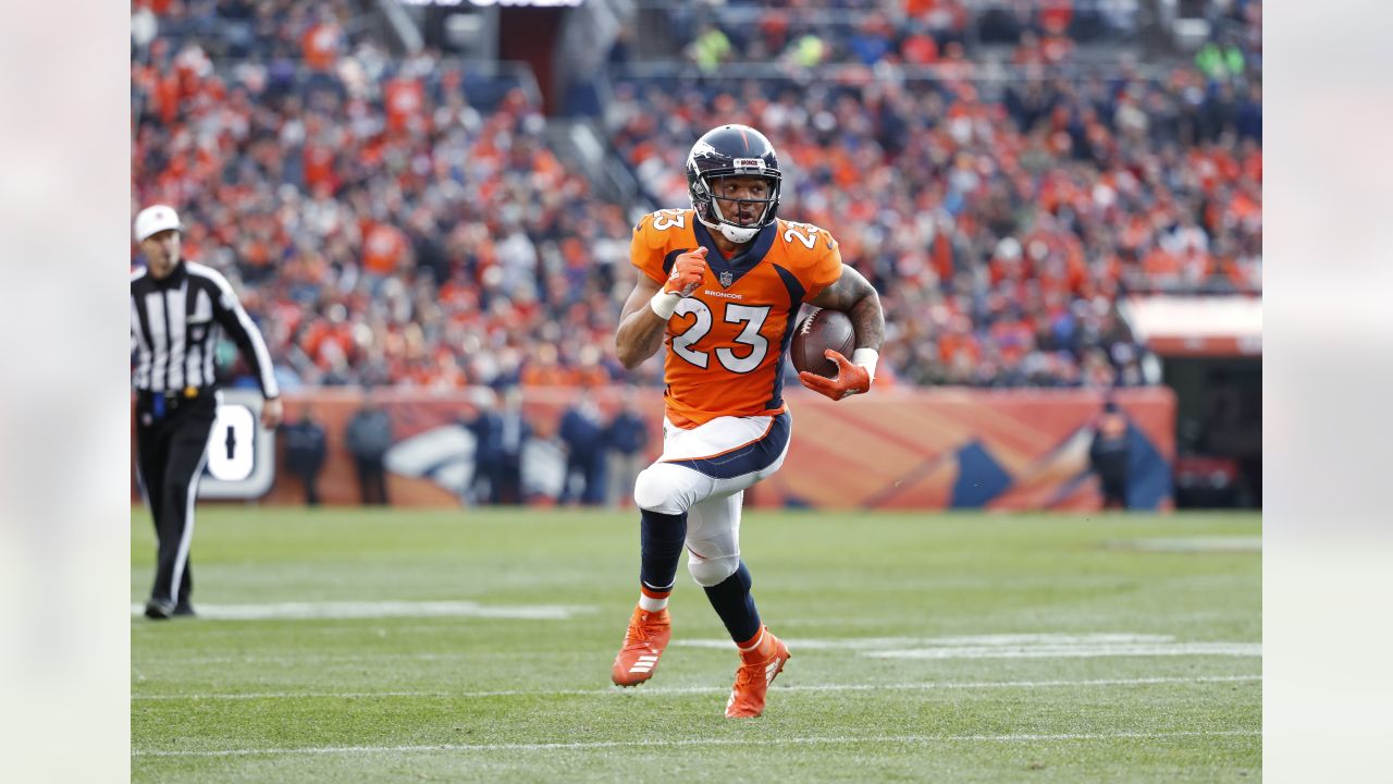 Denver running back Devontae Booker runs down field to the Oakland 25-yard  line during the second quarter Sunday, Jan. 1, 2017, at Sports Authority  Field at Mile High in Denver. (The Gazette