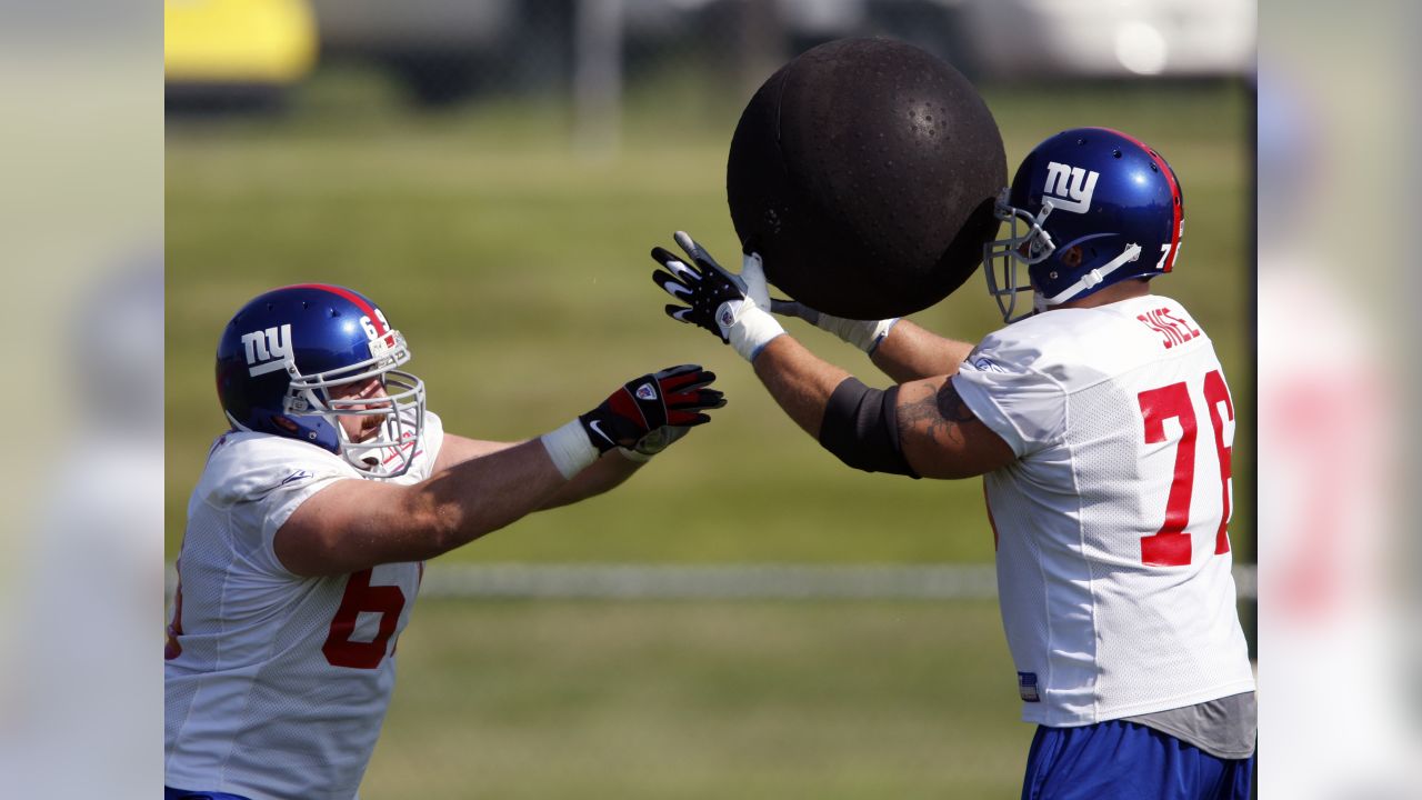 New York Giants NFL football draft pick Kayvon Thibodeaux holds up a jersey  with his mother Shawnta Smith during a press conference in East Rutherford,  N.J. on Saturday, April 30, 2022. (AP