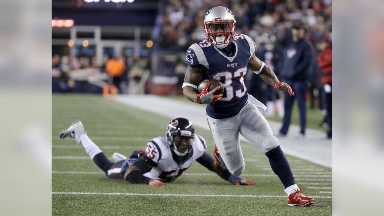 FILE - In this Dec. 4, 2016, file photo, New England Patriots running back  LeGarrette Blount carries the ball against the Los Angeles Rams during the  first half of an NFL football