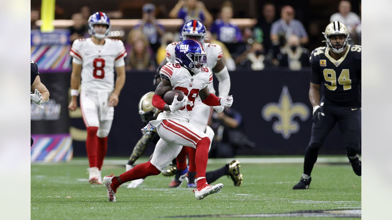 New York Giants running back Gary Brightwell (37) tackles New Orleans  Saints wide receiver Deonte Harris (11) during an NFL football game,  Sunday, Oct. 3, 2021, in New Orleans. (AP Photo/Tyler Kaufman