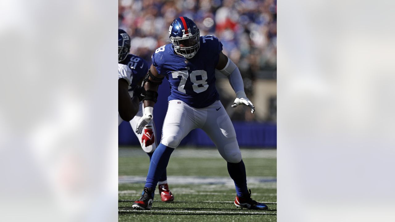 Philadelphia Eagles offensive tackle Lane Johnson (65) walks off the field  against the New York Giants during an NFL football game Sunday, Dec. 11,  2022, in East Rutherford, N.J. (AP Photo/Adam Hunger