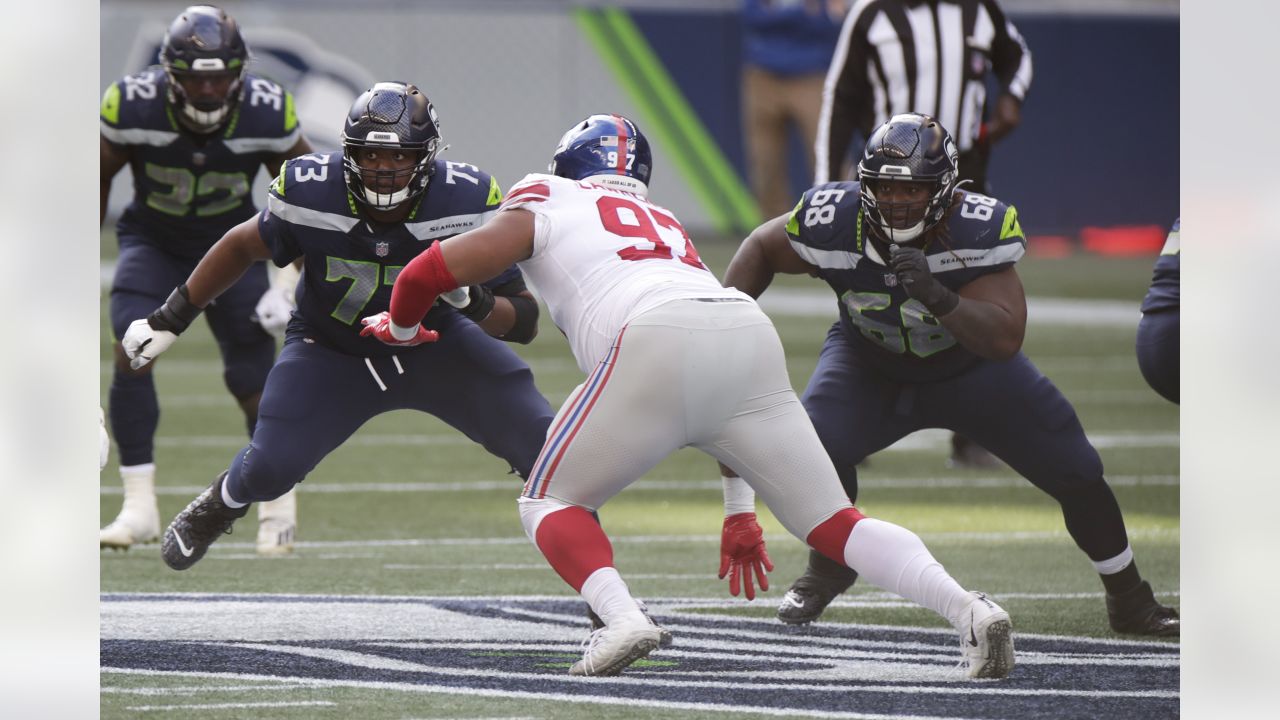 Seattle Seahawks guard Damien Lewis (68) gets set during an NFL football  game against the Carolina