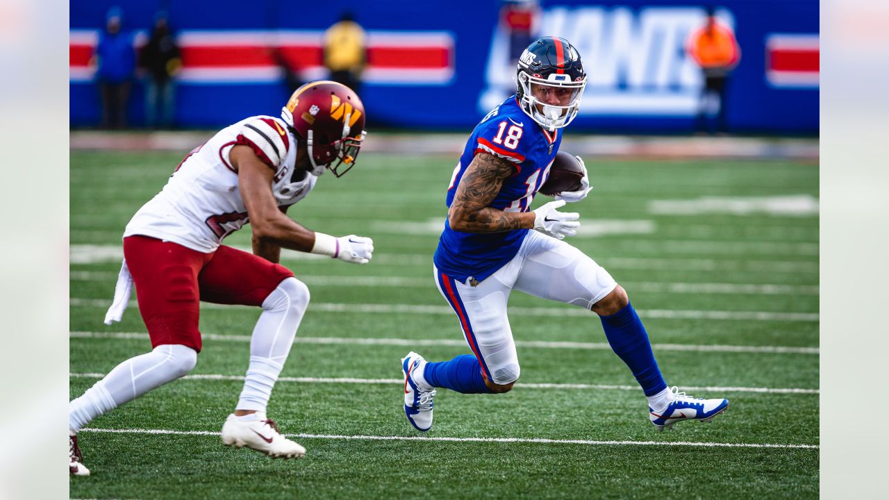 January 1, 2023, East Rutherford, New Jersey, USA: New York Giants wide  receiver Isaiah Hodgins (18) spikes the ball in the end zone after a  touchdown in the first half during a