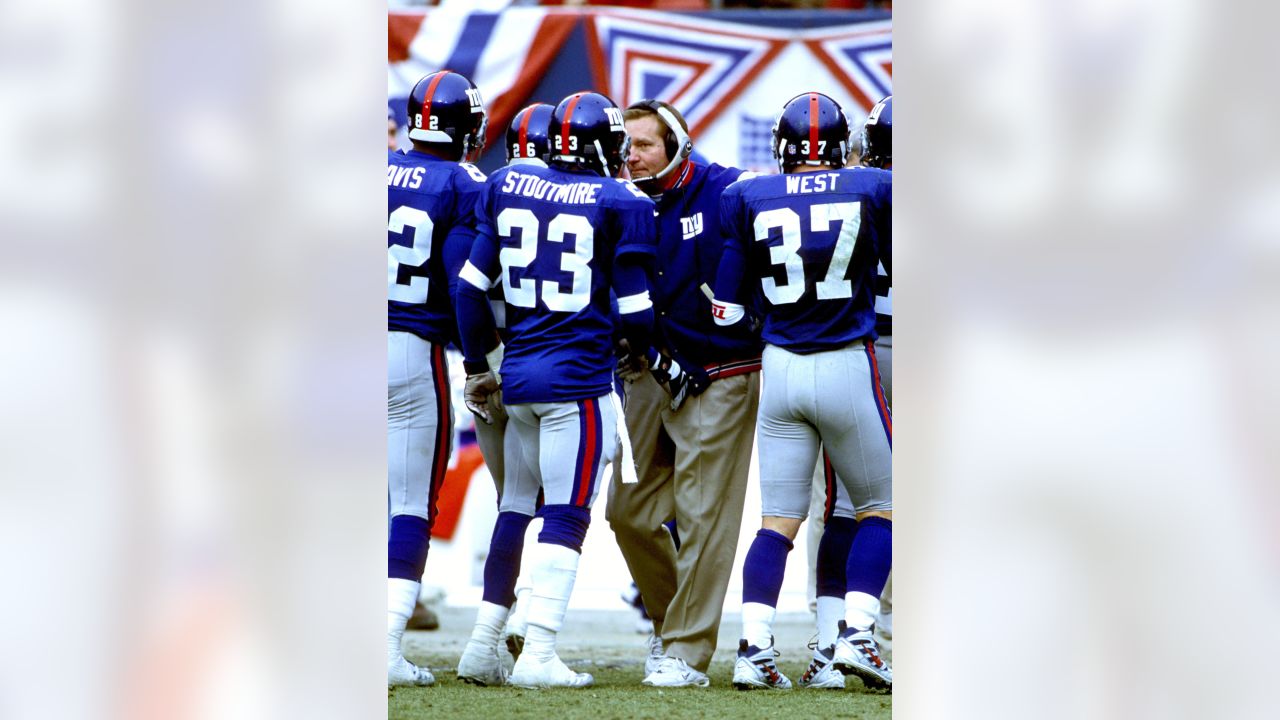 New York Giants head coach Jim Fassel wears his 2000 Super Bowl