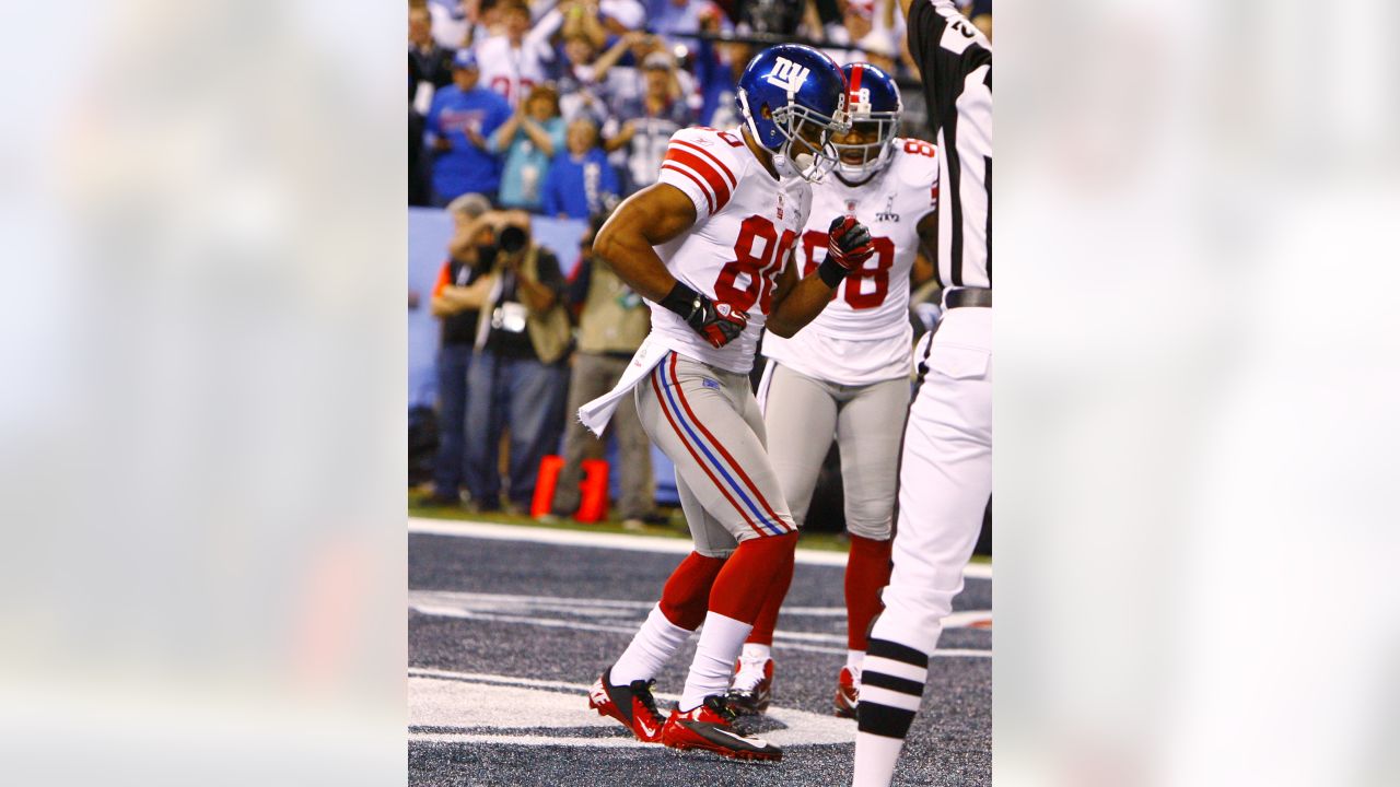 New York Giants - Super Bowl Football New York Giants Victor Cruz (80), and  Hakeem Nicks hoist up the Vince Lombardi Trophy after winning the NFL Super  Bowl XLVI football game against