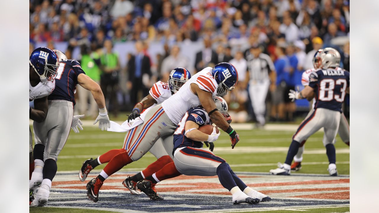 Running back Danny Woodhead (39) of the New England Patriots celebrates his  touchdown catch in the closing seconds of the first half against the New  York Giants during Superbowl XLVI on Sunday