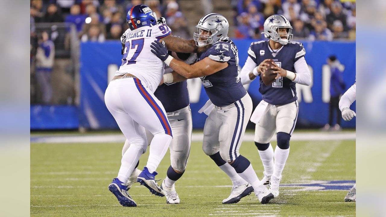 New York Giants defensive tackle Dexter Lawrence (97) is seen before an NFL  football game against the Dallas Cowboys, Thursday, Nov. 24, 2022, in  Arlington, Texas. Dallas won 28-20. (AP Photo/Brandon Wade