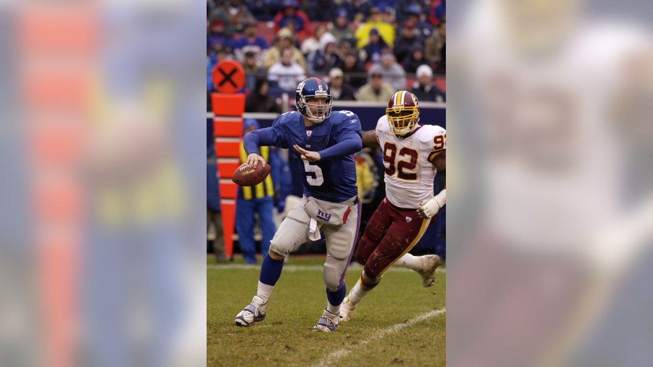 New York Giants receiver Ed McCaffrey snares a 17-yard pass from  quarterback Jeff Hostetler over Washington Redskins cornerback R. J.  Johnson (47) during the second quarter of game at RFK Stadium in