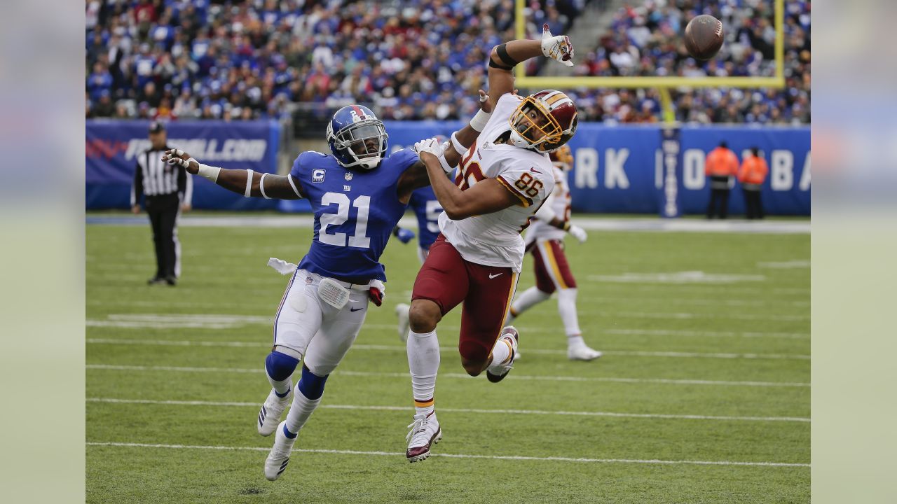 New York Giants strong safety Landon Collins (21) breaks up a pass intended for Washington Redskins tight end Jordan Reed (86) during the third quarter of an NFL football game, Sunday, Oct. 28, 2018, in East Rutherford, N.J. (AP Photo/Seth Wenig)