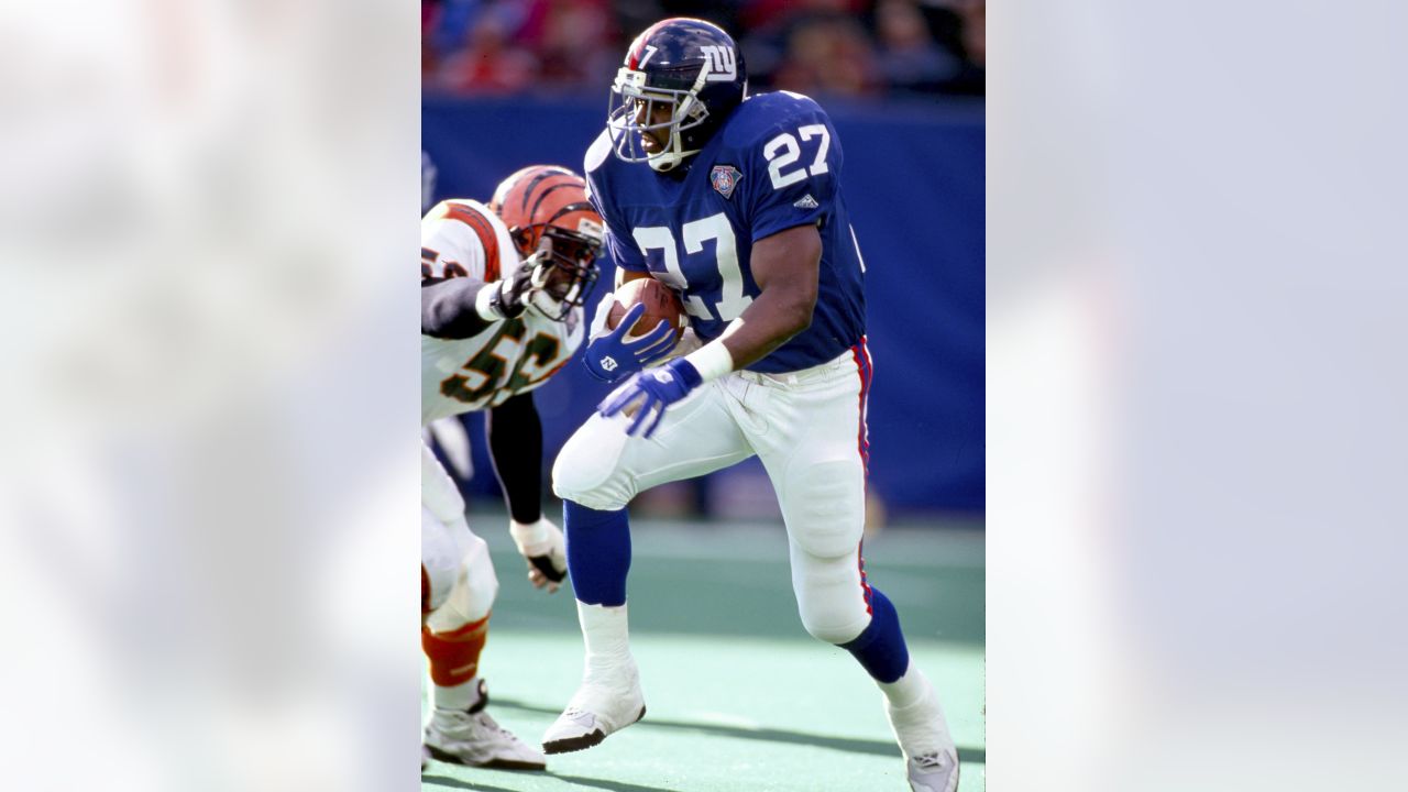 Rodney Hampton (27) of the New York Giants is tackled from behind