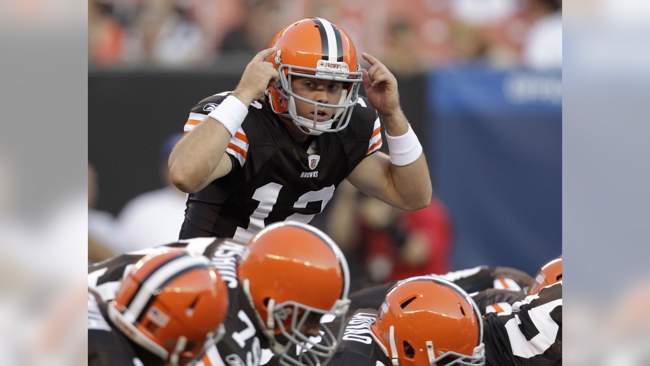 New York Giants defensive lineman Austin Johnson celebrates with  quarterback Colt McCoy (12) af …