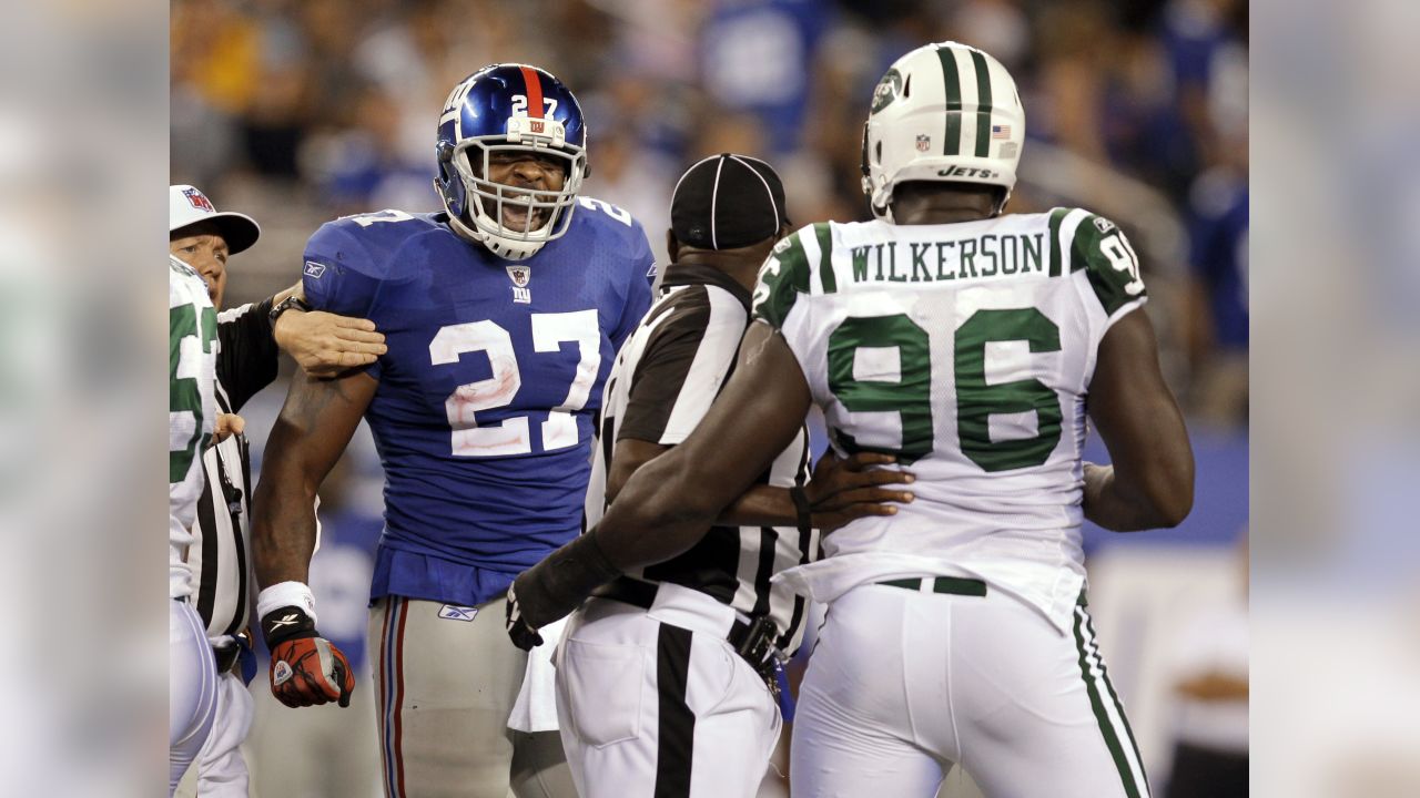 New York Giants quarterback Eli Manning looks disappointed while talking to  the coaches up stairs. The Philadelphia Eagles defeated the New York Giants  27 to 6 at Giants Stadium in East Rutherford