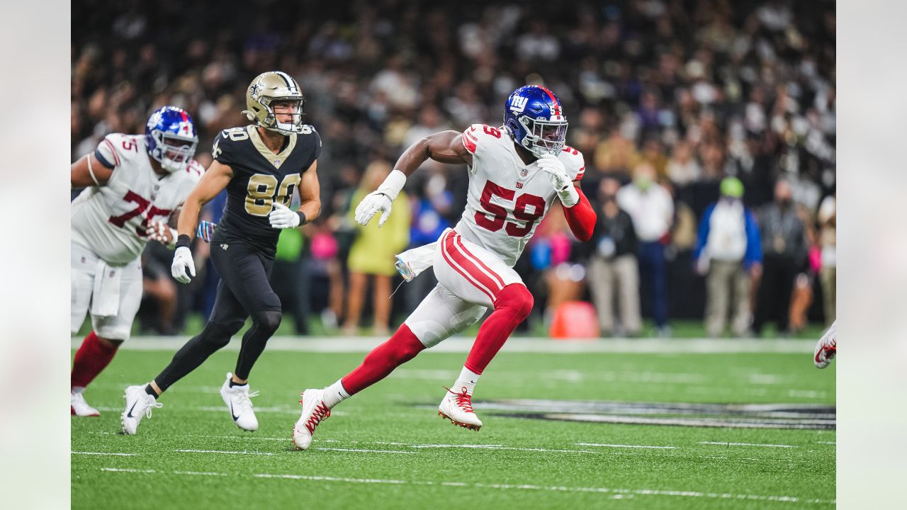 New York Giants wide receiver John Ross (12) catches the ball to score a  touchdown in front of New Orleans Saints cornerback Paulson Adebo (29)  during an NFL football game, Sunday, Oct.