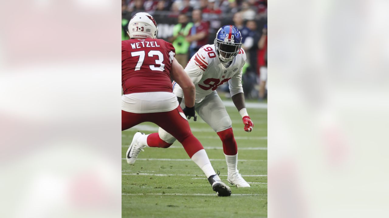 New York Giants defensive end Jason Pierre-Paul (90) knocks the