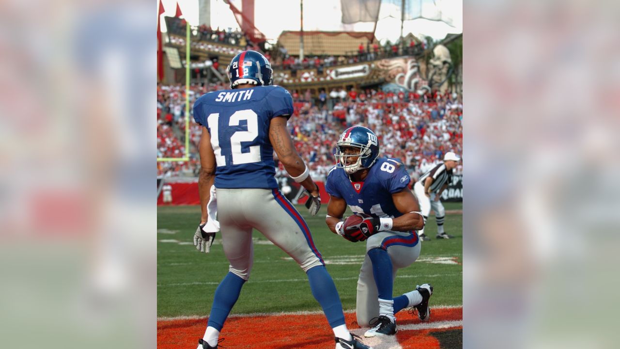 Tampa Bay Buccaneers Ronde Barber chases New York Giants Victor Cruz who  catches an 80 yard touchdown pass in the fourth quarter in week 2 of the  NFL season at MetLife Stadium