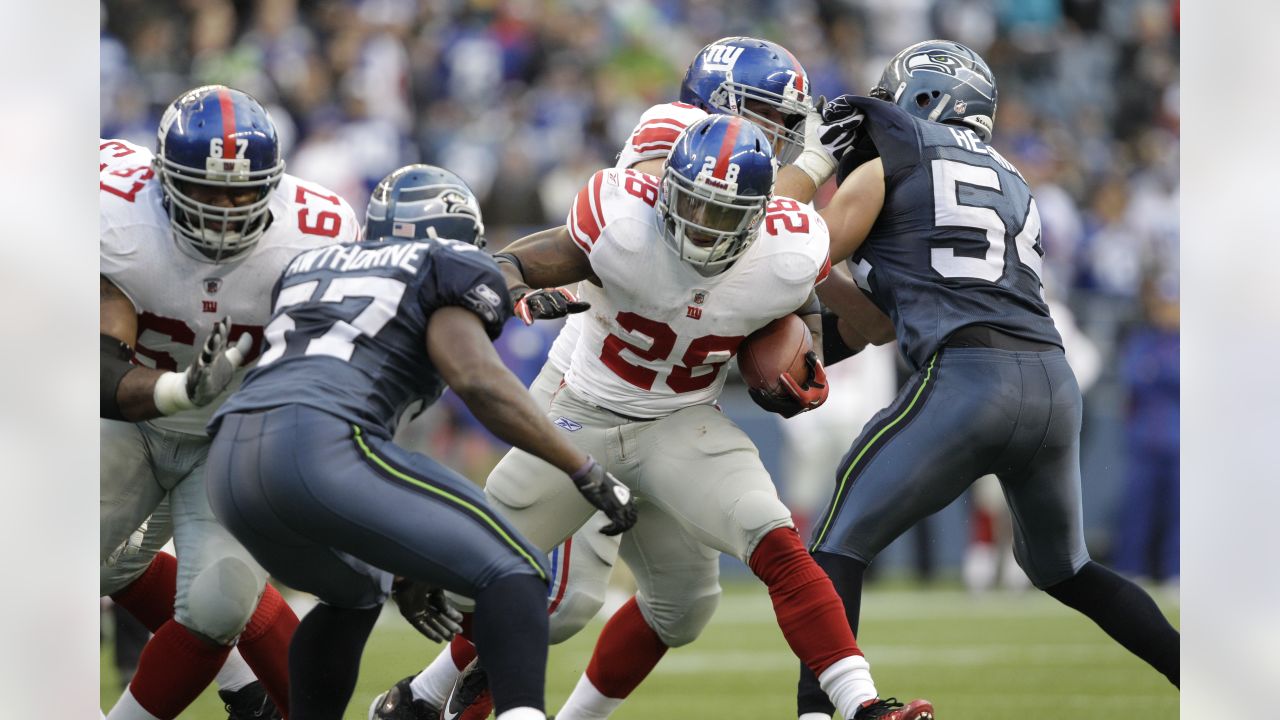 Seattle Seahawks Lofa Tatupu takes the field before the action against the  New York Giants in an NFL football game, Sunday, Nov. 7, 2010, in Seattle.  (AP Photo/Ted S. Warren Stock Photo 