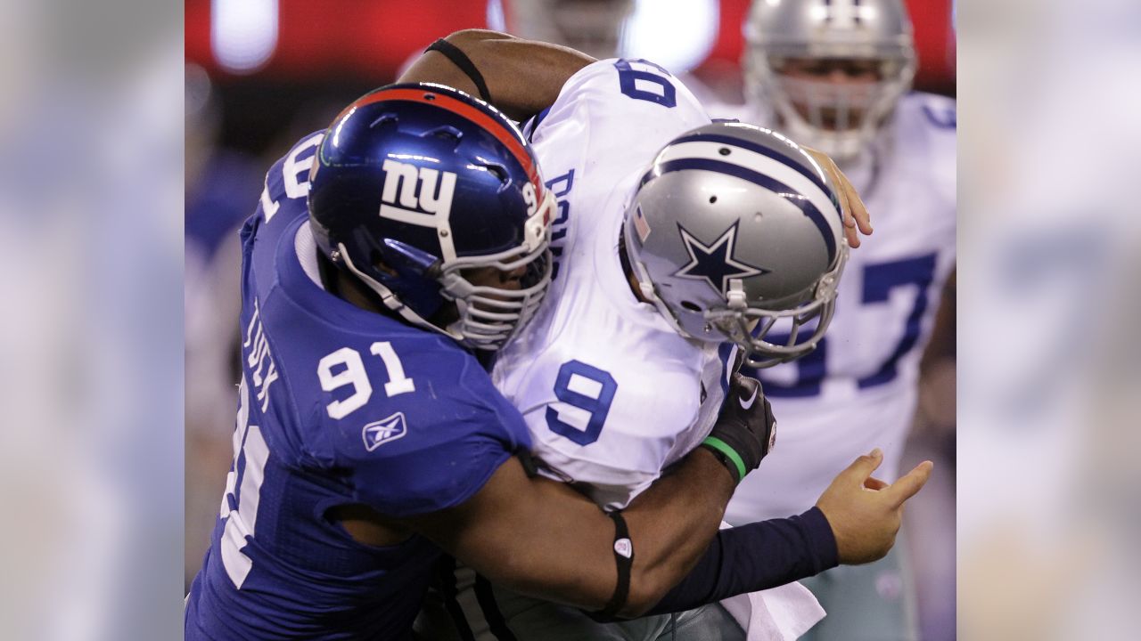 New York Giants defensive end Justin Tuck (91) celebrates his defense  causing a turnover during second half week 12 NFL action between the New  York Giants and Jacksonville Jaguars at New Meadowlands