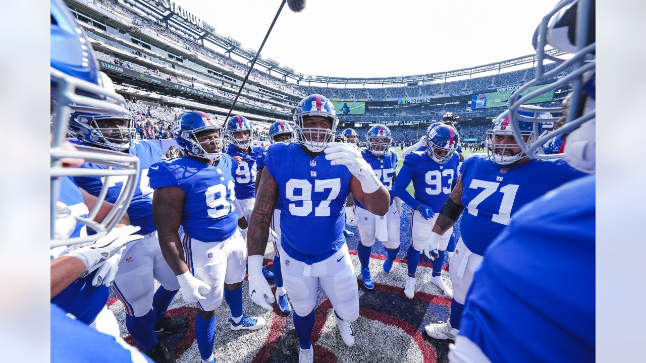 Las Vegas Raiders' Tyree Gillespie (37) tackles New York Giants' Pharoh  Cooper (83) during the …