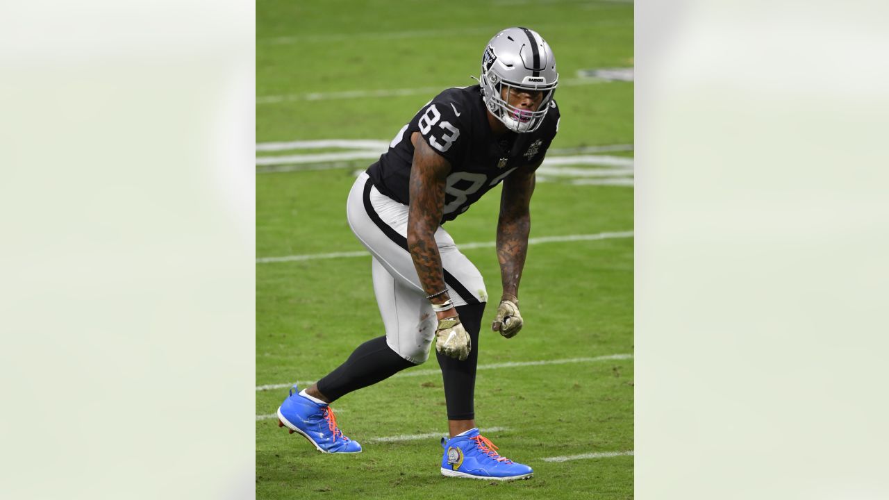 Las Vegas Raiders tight end Darren Waller (83) walks on the field during  the first quarter of a …