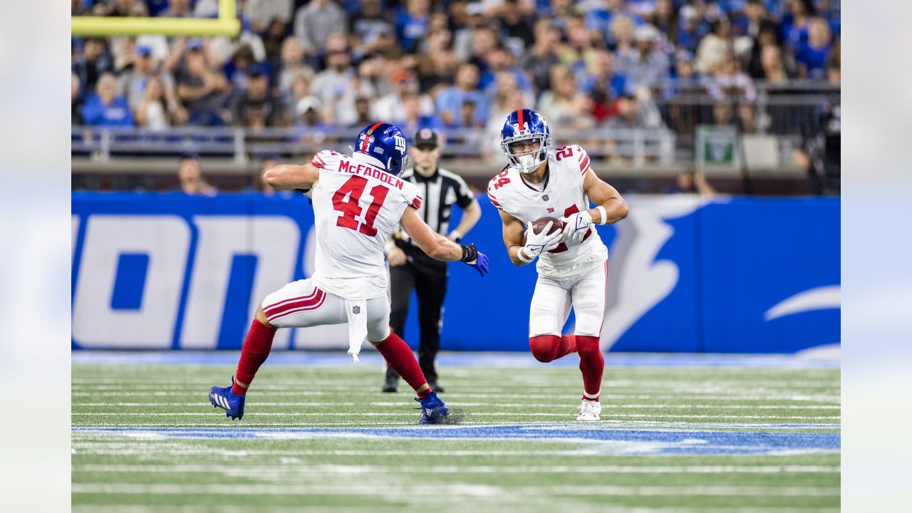 New York Giants safety Dane Belton (24) and linebacker Tomon Fox