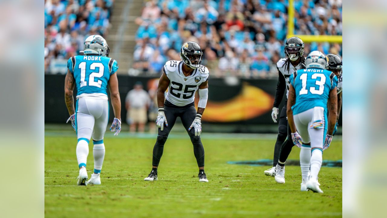 Jacksonville Jaguars quarterback Gardner Minshew (15) runs against the Carolina  Panthers during …