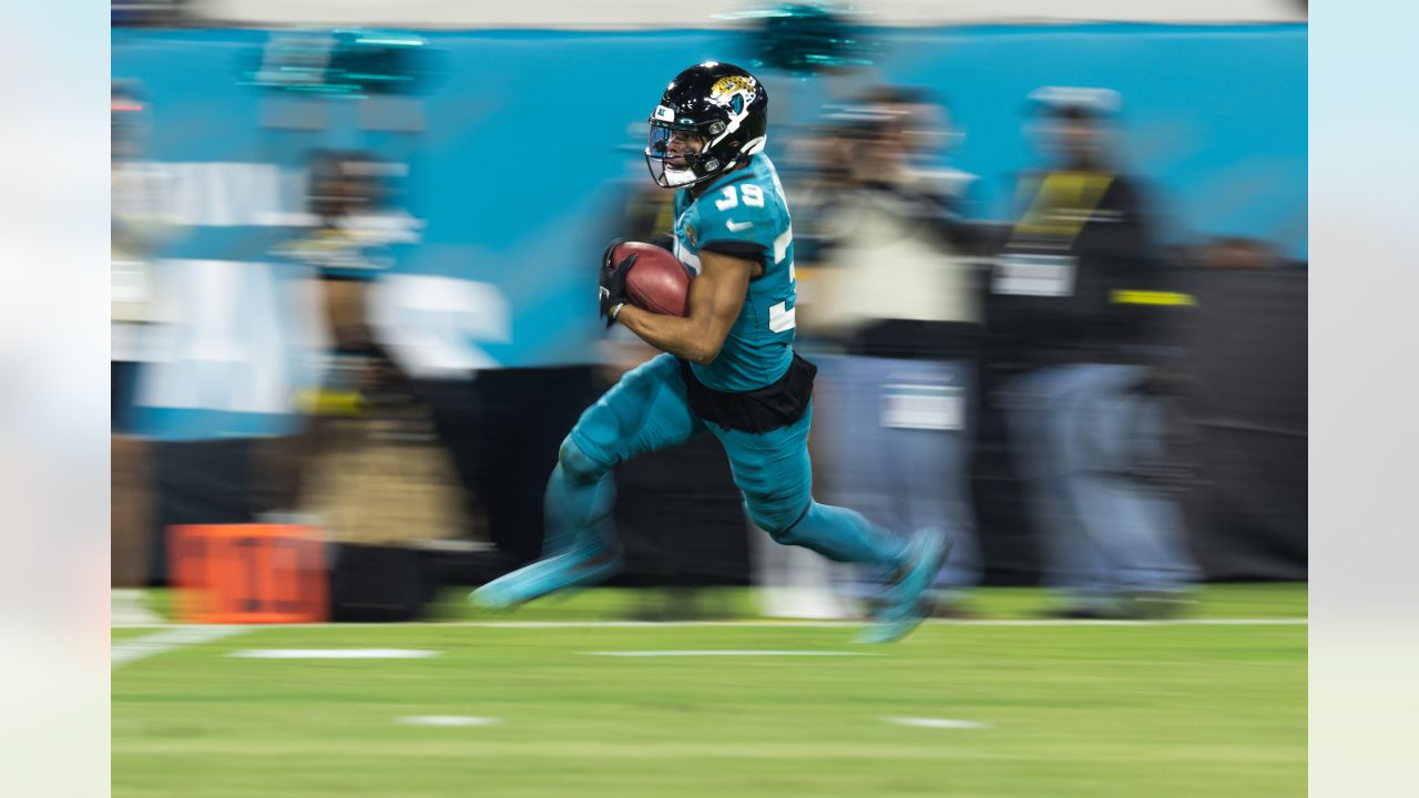 Jacksonville, Florida, USA. January 7, 2023: Jacksonville Jaguars wide  receiver JAMAL AGNEW (39) gets tackled after returning the ball during the Jacksonville  Jaguars vs Tennessee Titans NFL game at TIAA Bank Field