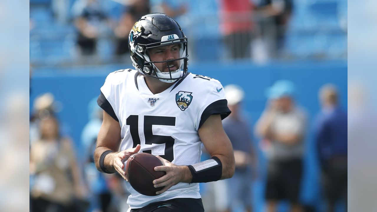 Jacksonville Jaguars quarterback Gardner Minshew (15) runs against the Carolina  Panthers during …