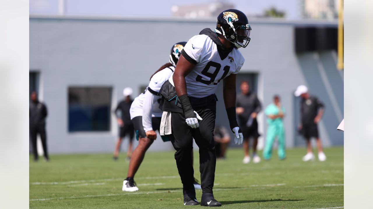 Jacksonville Jaguars tight end Chris Manhertz (84) walks off the field  after an NFL football game against the Denver Broncos at Wembley Stadium in  London, Sunday, Oct. 30, 2022. The Denver Broncos