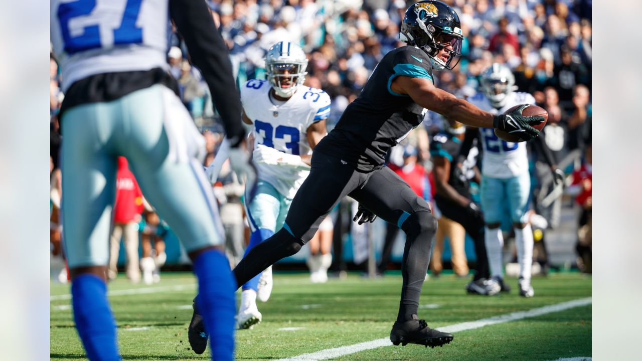 Jacksonville Jaguars quarterback Trevor Lawrence (16) shapes to pass during  an NFL International Series game against the Miami Dolphins at Tottenham  Hotspur Stadium, Sunday, Oct. 17, 2021, in London, United Kingdom. The