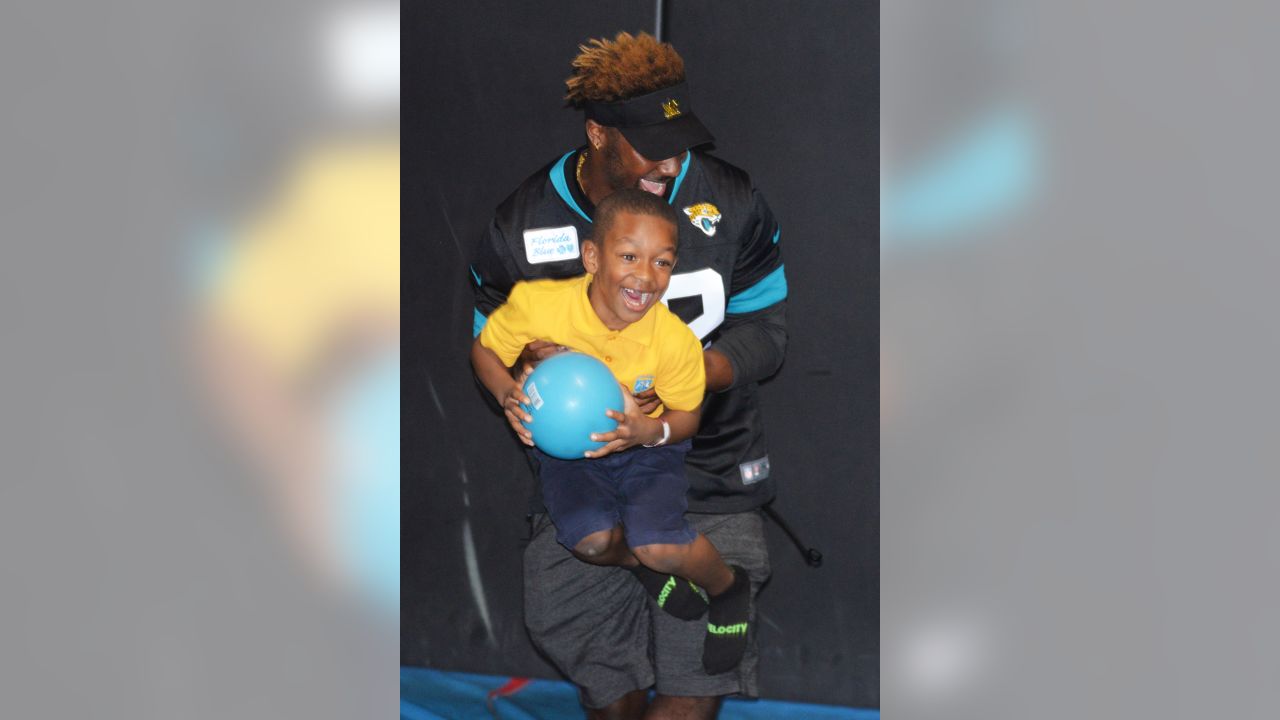 Jacksonville Jaguars players participate during the Crucial Catch Survivor Celebration against the Tuesday, October 16, 2018 at Flight Fit N Fun in Jacksonville, Fla. (Rick Wilson/Jacksonville Jaguars)